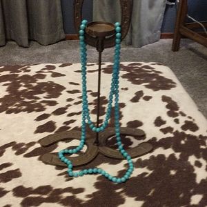 Turquoise colored beaded necklace